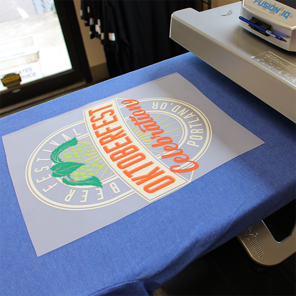 Pressed t-shirt showing hot peel DTF transfer print quality